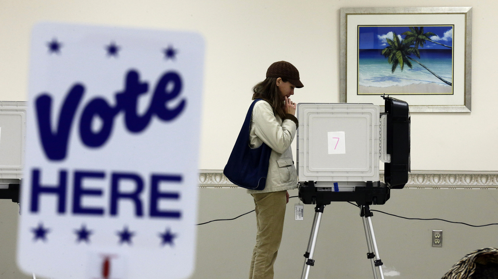 Kimberly Fisher cast her ballot Wednesday at a polling place at the Wicomico County Youth and Civic Center in Salisbury, Md.