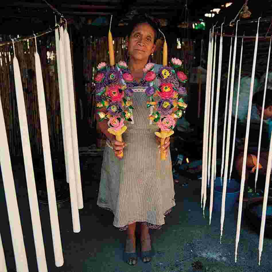 Biviana Alvarez Hipolito, candle maker, Teotitlan del Valle, Oaxaca. Every petal of the wax flowers is handmade from wax molds.