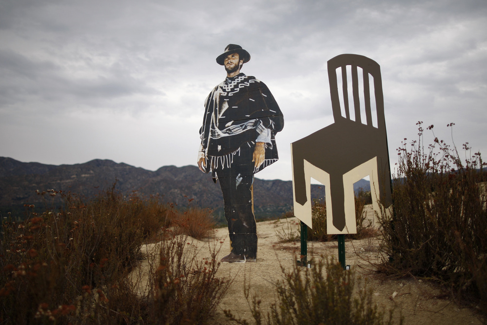 A life-sized cardboard cutout of actor, director and politician Clint Eastwood stands next to an empty chair cutout north of Los Angeles, California. Eastwood's 12-minute conversation with an empty chair representing President Obama sparked much attention at the 2012 Republican National Convention.
