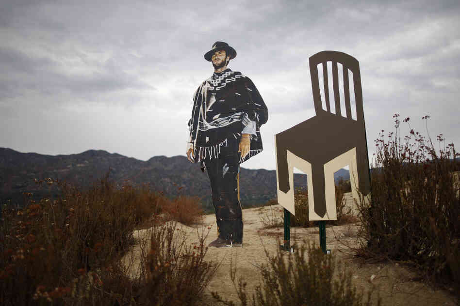 A life-sized cardboard cutout of actor, director and politician Clint Eastwood stands next to an empty chair cutout north of Los Angeles, California. Eastwood's 12-minute conversation with an empty chair representing President Obama sparked much attention at the 2012 Republican National Convention.