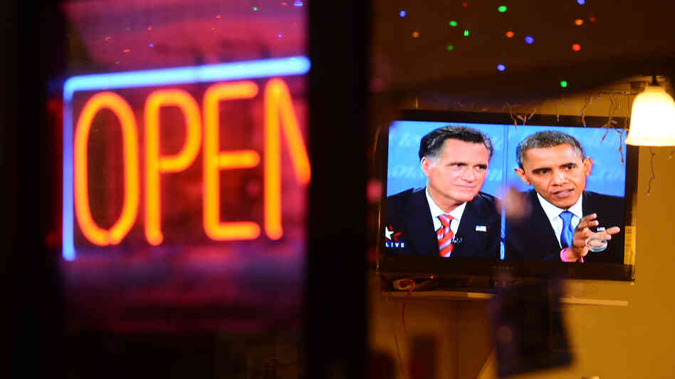 The debate between President Obama and Republican challenger Mitt Romney is seen on a TV in a Korean restaurant Oct. 22 in Los Angeles, Calif. The debate between President Obama and Republican challenger Mitt Romney is seen on a TV in a Korean restaurant Oct. 22 in Los Angeles, Calif.