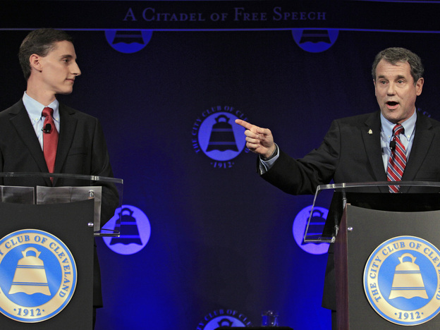 U.S. Sen. Sherrod Brown (right), D-Ohio, debates his Republican challenger, Ohio state Treasurer Josh Mandel, at the City Club in Cleveland on Oct. 15.