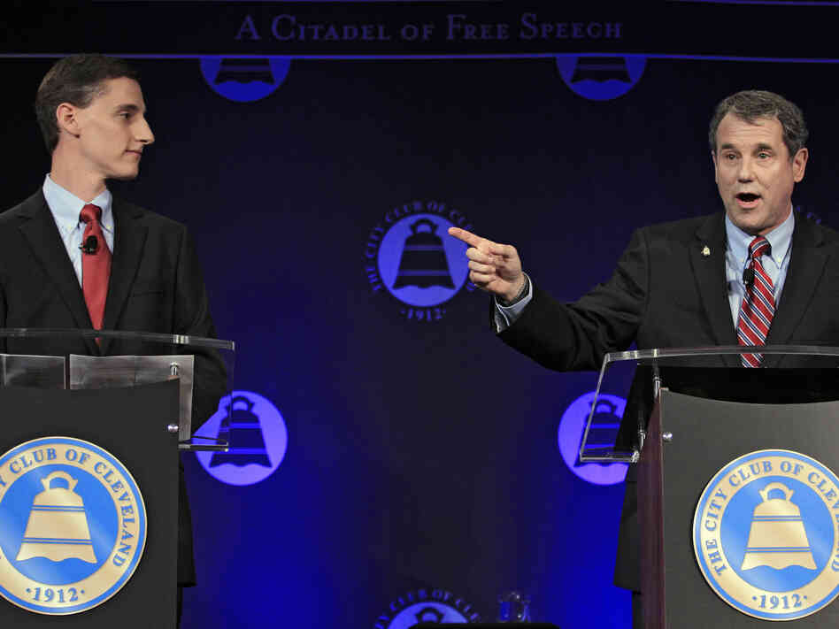 U.S. Sen. Sherrod Brown (right), D-Ohio, debates his Republican challenger, Ohio state Treasurer Josh Mandel, at the City Club in Cleveland on Oct. 15.