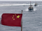China is currently involved in several disputes with its neighbors over small islands, many of them uninhabited. Here, Chinese fishing boats sail off the island province of Hainan in the South China Sea in July. China is currently involved in several disputes with its neighbors over small islands, many of them uninhabited. Here, Chinese fishing boats sail off the island province of Hainan in the South China Sea in July.