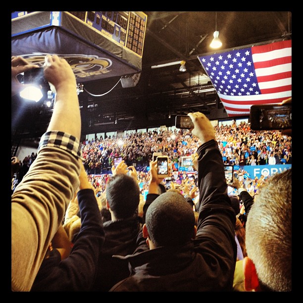 White House Correspondent Ari Shapiro stood among a crowd of spectators with their smartphone cameras held high, hoping to snap a shot of President Obama during a campaign rally. We suspect Shapiro was not the only onlooker who posted his photo to Instagram afterwards.
