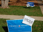 Rick and Cindy Oleshak of Webster Groves, Mo., put up "his" and "hers" yard signs about a week ago. They say they can no longer watch presidential debates together. Rick and Cindy Oleshak of Webster Groves, Mo., put up "his" and "hers" yard signs about a week ago. They say they can no longer watch presidential debates together.