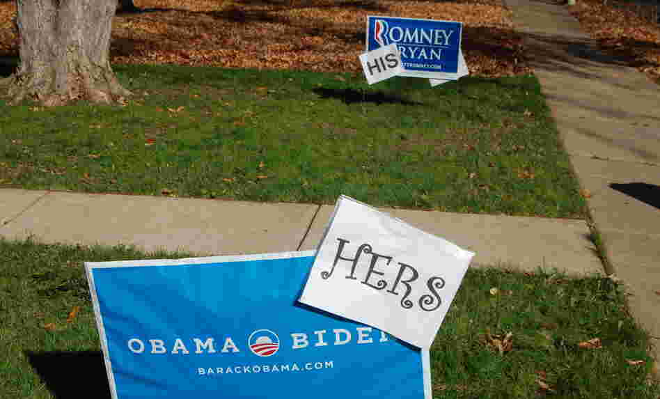 Rick and Cindy Oleshak of Webster Groves, Mo., put up "his" and "hers" yard signs about a week ago. They say they can no longer watch presidential debates together. Rick and Cindy Oleshak of Webster Groves, Mo., put up "his" and "hers" yard signs about a week ago. They say they can no longer watch presidential debates together.