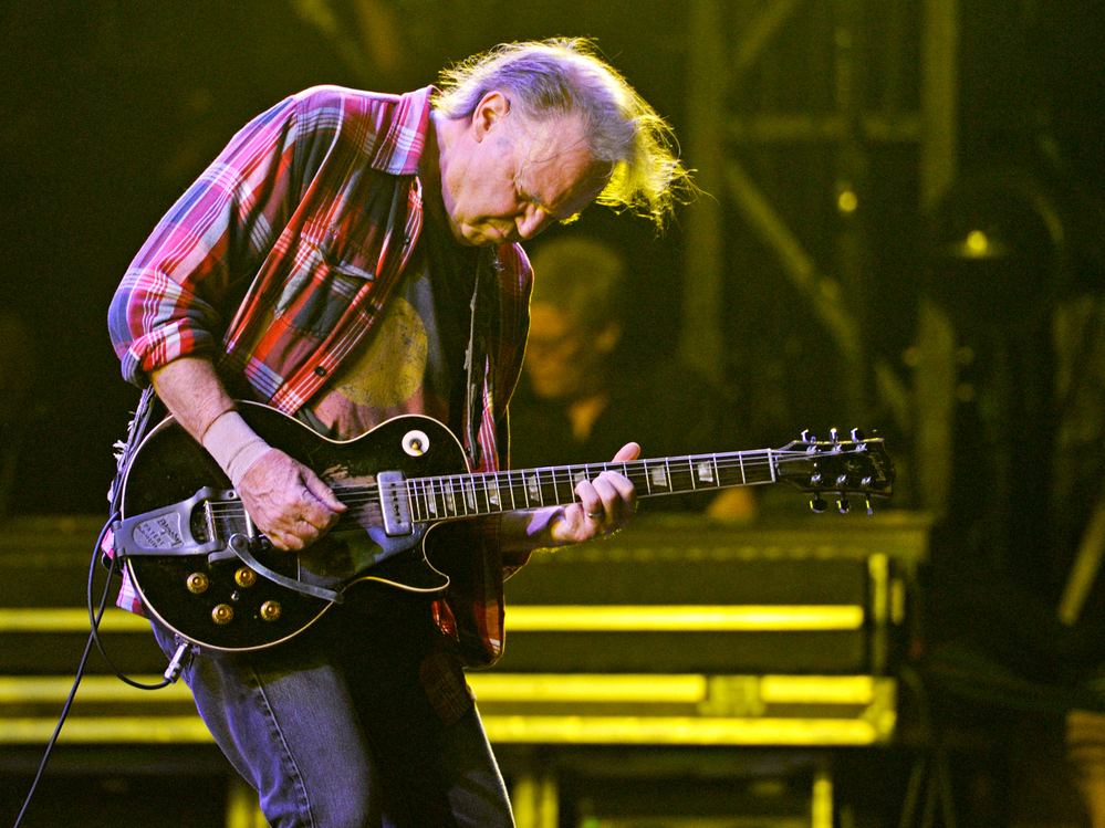 Neil Young, who turns 67 years old this month, performs with Crazy Horse on Oct. 26 in New Orleans. In recent concerts the group has focused mostly on material from its new album, Psychedelic Pill.
