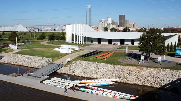 Rowers return to the Chesapeake Energy Boathouse after training on the river near downtown Oklahoma City. The riverfront recreation area is one of the most visible examples of the city's sales tax initiatives in action.