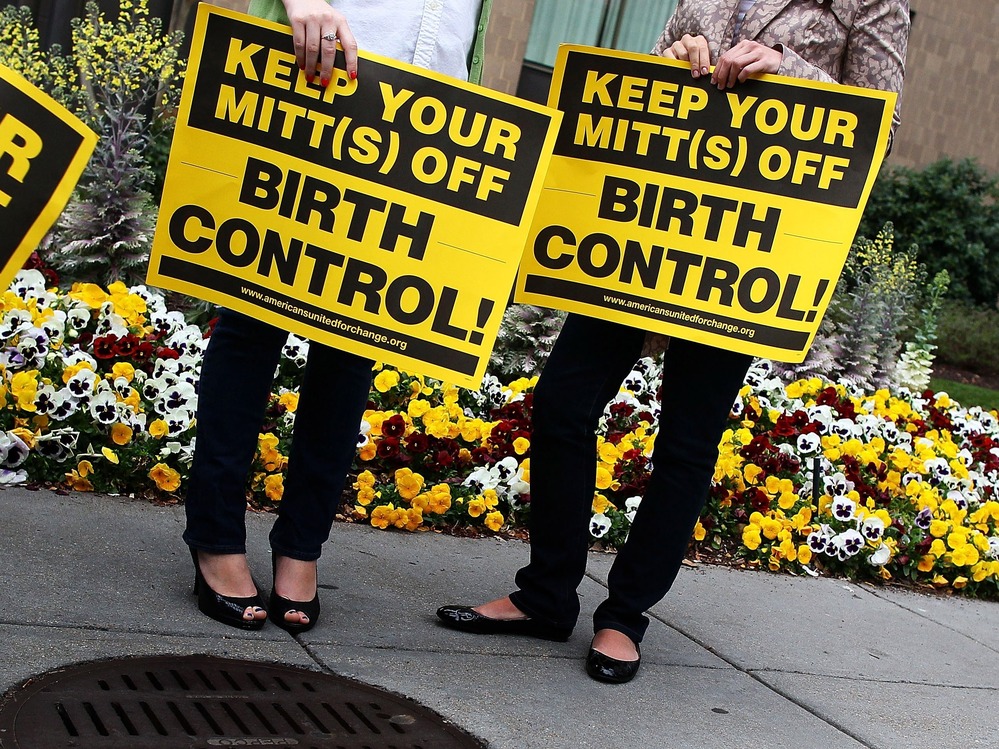 Women use wordplay to protest Republican presidential candidate Mitt Romney's position on women's health care outside the Hyatt Regency, where Romney was scheduled to attend a fundraiser, on March 22 in Washington, D.C.