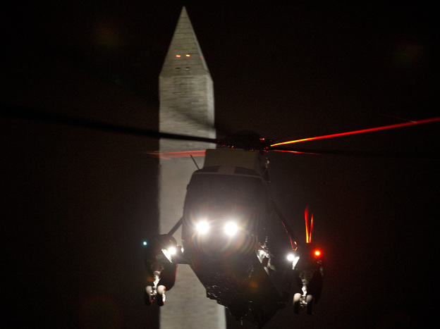 The Marine One helicopter carrying President Obama returns to the White House on Friday after Obama spent the day campaigning in Ohio. Both the president and Mitt Romney were to be on the road all weekend, campaigning in a handful of swing states.