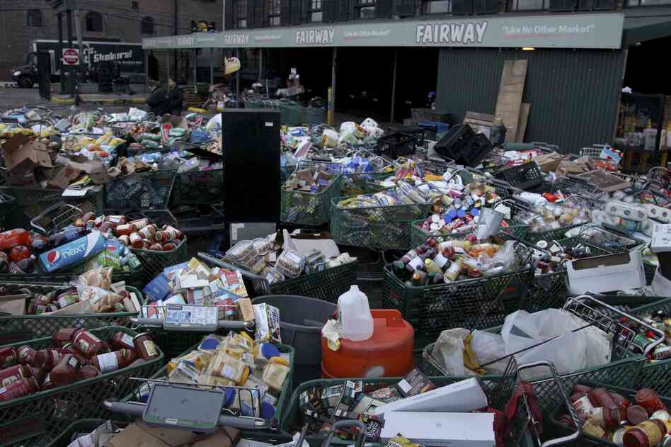 Food damaged by storm flooding awaits disposal at the Fairway supermarket in Brooklyn. Food damaged by storm flooding awaits disposal at the Fairway supermarket in Brooklyn.