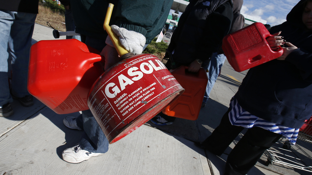 Rather than sit in their cars, many people on Staten Island today lined up at stations with gas cans — hoping to get a few gallons before supplies ran out. Rather than sit in their cars, many people on Staten Island today lined up at stations with gas cans — hoping to get a few gallons before supplies ran out.