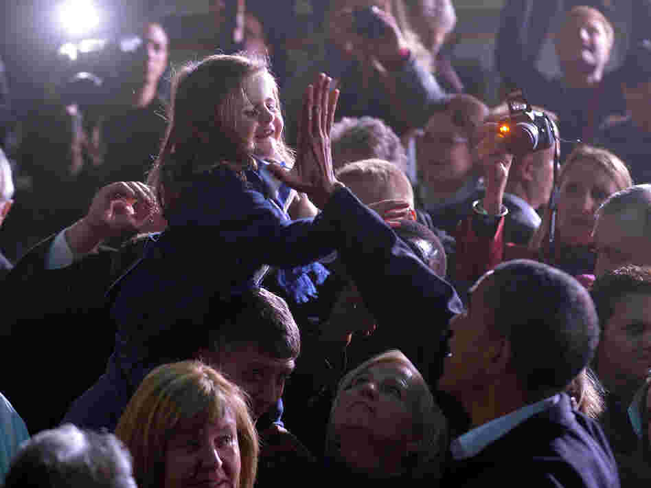 President Obama gives a girl a high five at a campaign rally in Hilliard, Ohio, on Nov. 2.