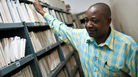 Radio Tanzania archivist Bruno Nanguka stands with just a few of the 15,000 reel-to-reel tapes stored in the station's archives. Radio Tanzania archivist Bruno Nanguka stands with just a few of the 15,000 reel-to-reel tapes stored in the station's archives.