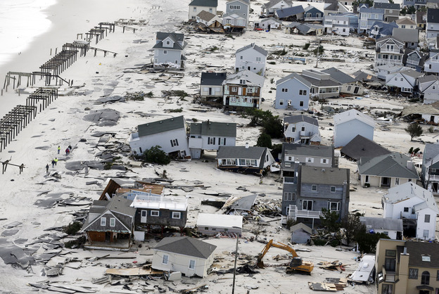 This aerial photo shows destruction in the wake of Superstorm Sandy on Wednesday in Seaside Heights, N.J.