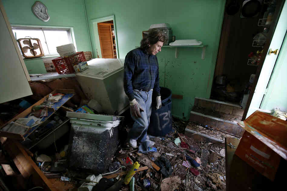 Steve Santo stands in the kitchen of his house on the south side of the New York City borough of Staten Island on Friday. 