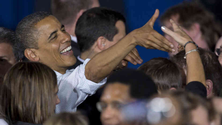President Obama greets audience members Saturday after speaking at a campaign event at Mentor High School in Mentor, Ohio, before traveling to Milwaukee for another campaign event.
