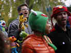 A marcher with a puppet of Bert, the Muppet character from Sesame Street, shouts during The Million Muppet March in Washington, D.C., on Saturday. The bipartisan rally was organized to show support for public broadcasting following Republican presidential candidate Mitt Romney's pledge to cut funding to PBS.