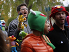 A marcher with a puppet of Bert, the Muppet character from Sesame Street, shouts during The Million Muppet March in Washington, D.C., on Saturday. The bipartisan rally was organized to show support for public broadcasting following Republican presidential candidate Mitt Romney's pledge to cut funding to PBS. A marcher with a puppet of Bert, the Muppet character from Sesame Street, shouts during The Million Muppet March in Washington, D.C., on Saturday. The bipartisan rally was organized to show support for public broadcasting following Republican presidential candidate Mitt Romney's pledge to cut funding to PBS.