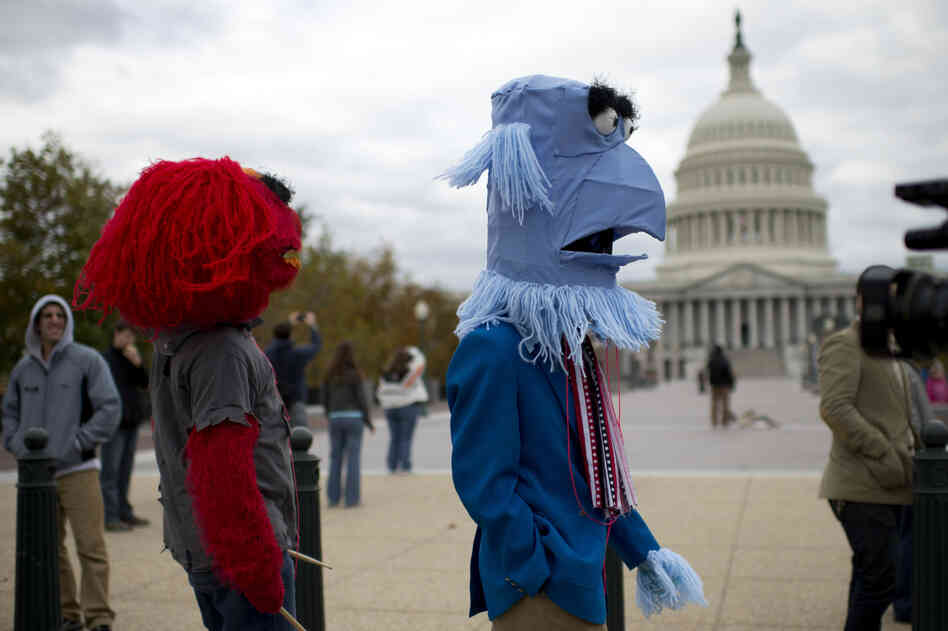 PBS supporters take part in the Million Puppet March, which featured entertainment from puppeteers, music and remarks from supporters around the country.