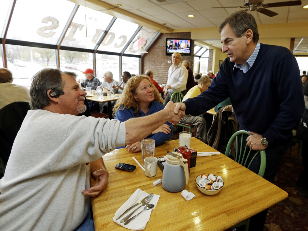 Republican Richard Mourdock, candidate for Indiana's U.S. Senate seat (right) meets Mike Nestor and LoRita Stofleth at Blueberry Hill Pancake House Saturday in Indianapolis.
