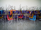 School desks are piled on top of each other at the shuttered H.S. Thompson Elementary School in Dallas. Thompson was one of 11 schools closed by the Dallas Independent School District in 2012. School desks are piled on top of each other at the shuttered H.S. Thompson Elementary School in Dallas. Thompson was one of 11 schools closed by the Dallas Independent School District in 2012.