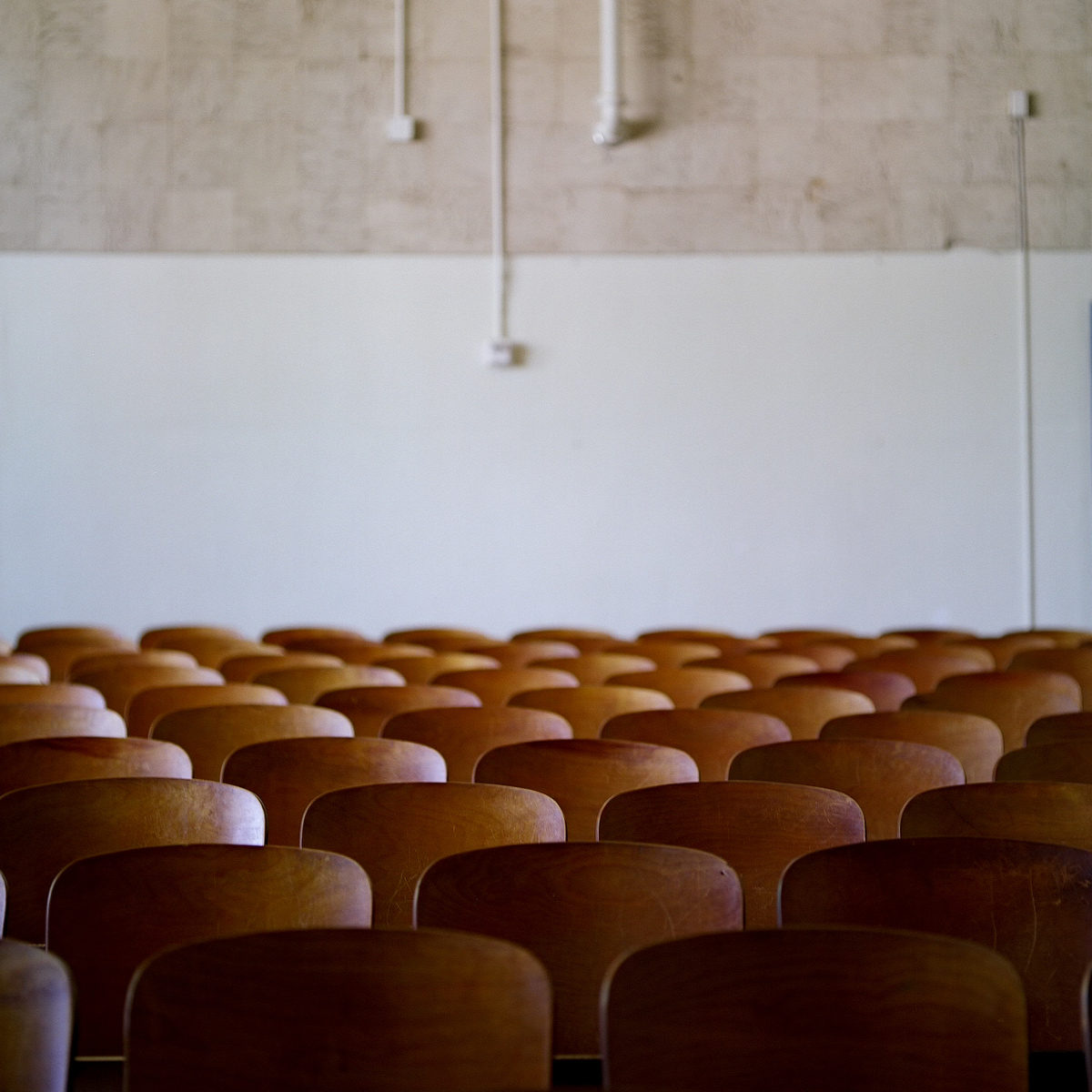 An empty theater at H.S. Thompson Elementary School.