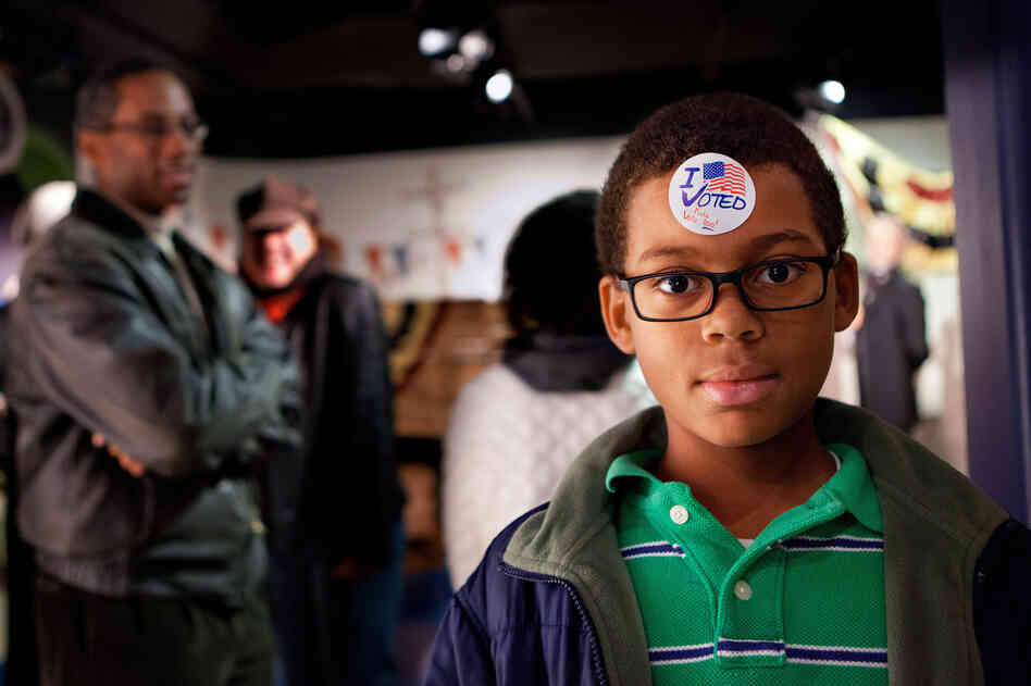 Noah Hope, 10, shows off his I Voted sticker during the children's mock Election Day at Madame Tussaud Wax Museum in Washington D.C. Noah Hope, 10, shows off his I Voted sticker during the children's mock Election Day at Madame Tussaud Wax Museum in Washington D.C.