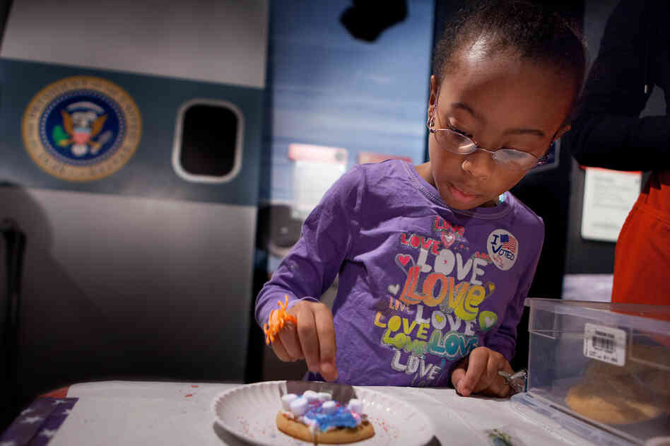 Olyvia Berry, 7, decorates a sugar cookie at Madame Tussauds Wax Museum. Encouraging kids to vote through age appropriate activities is a fun way to share Election Day. Olyvia Berry, 7, decorates a sugar cookie at Madame Tussauds Wax Museum. Encouraging kids to vote through age appropriate activities is a fun way to share Election Day.