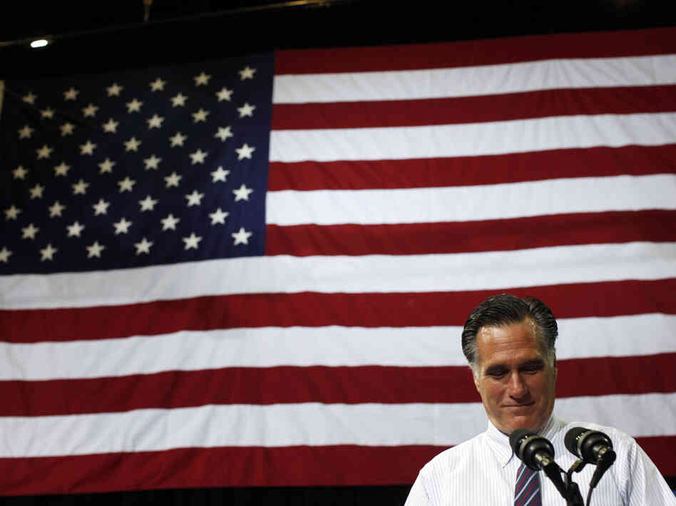 Republican presidential nominee Mitt Romney pauses while speaking at a campaign rally at the Patriot Center at George Mason University in Fairfax, Va., on Monday.
