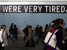 Commuters disembark the Staten Island Ferry one week after Superstorm Sandy crashed into the metropolitan area.