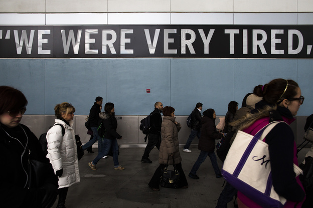 Commuters disembark the Staten Island Ferry one week after Superstorm Sandy crashed into the metropolitan area.