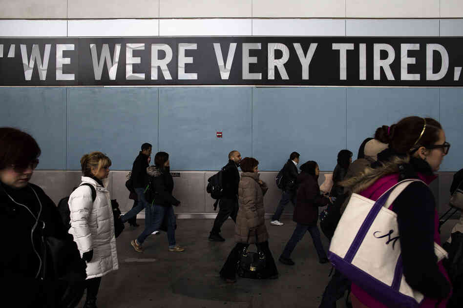Commuters disembark the Staten Island Ferry one week after Superstorm Sandy crashed into the metropolitan area.