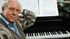 Composer Elliott Carter at the piano in 1989. Composer Elliott Carter at the piano in 1989.
