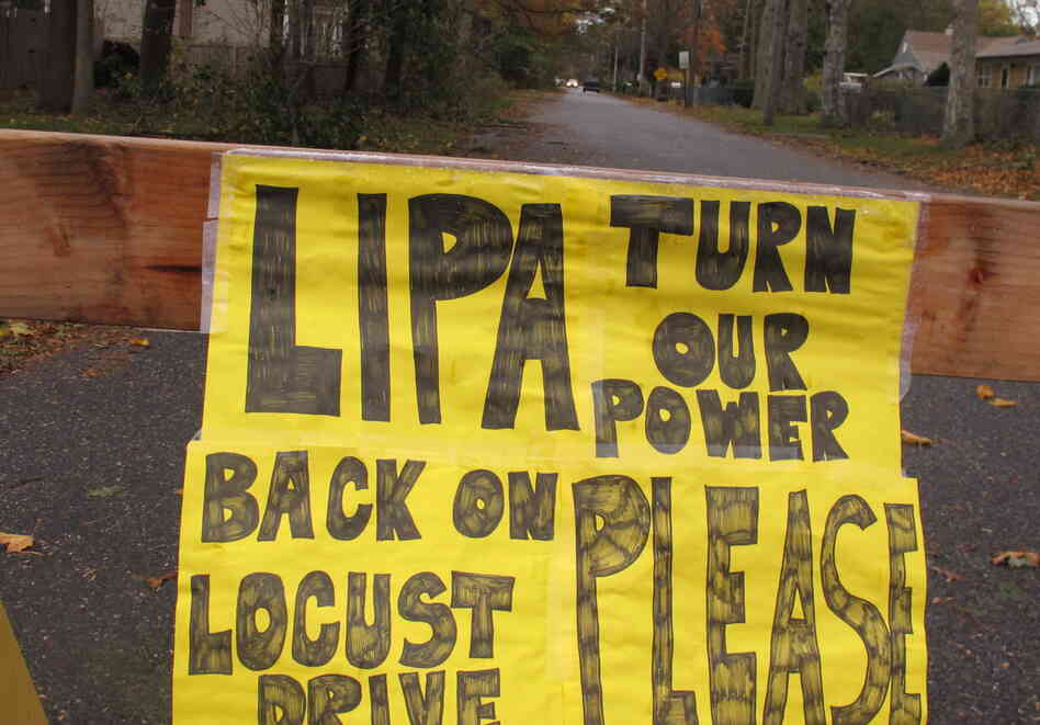 A plea to the Long Island Power Authority for electricity to be restored is posted on a barrier last Wednesday in Mastic Beach, N.Y. The south shore Long Island community was among the hardest hit by the storm that pounded the Northeast. A plea to the Long Island Power Authority for electricity to be restored is posted on a barrier last Wednesday in Mastic Beach, N.Y. The south shore Long Island community was among the hardest hit by the storm that pounded the Northeast.