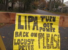 A plea to the Long Island Power Authority for electricity to be restored is posted on a barrier last Wednesday in Mastic Beach, N.Y. The south shore Long Island community was among the hardest hit by the storm that pounded the Northeast. A plea to the Long Island Power Authority for electricity to be restored is posted on a barrier last Wednesday in Mastic Beach, N.Y. The south shore Long Island community was among the hardest hit by the storm that pounded the Northeast.