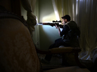 A Syrian rebel fighter takes aim at government forces from an apartment in the northern city of Aleppo on Saturday. While the fighting rages, the Syrian opposition is holding talks in Qatar in an attempt to create a new, more unified front. The U.S. announced last week that it favors an overhaul of the opposition leadership. A Syrian rebel fighter takes aim at government forces from an apartment in the northern city of Aleppo on Saturday. While the fighting rages, the Syrian opposition is holding talks in Qatar in an attempt to create a new, more unified front. The U.S. announced last week that it favors an overhaul of the opposition leadership.