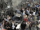 Syrians gather at the site of a car bombing Monday that killed 11 people and wounded dozens in Damascus, according to the SANA news agency, which provided the photo. The violence in the city was described as some of the worst in recent months. Syrians gather at the site of a car bombing Monday that killed 11 people and wounded dozens in Damascus, according to the SANA news agency, which provided the photo. The violence in the city was described as some of the worst in recent months.