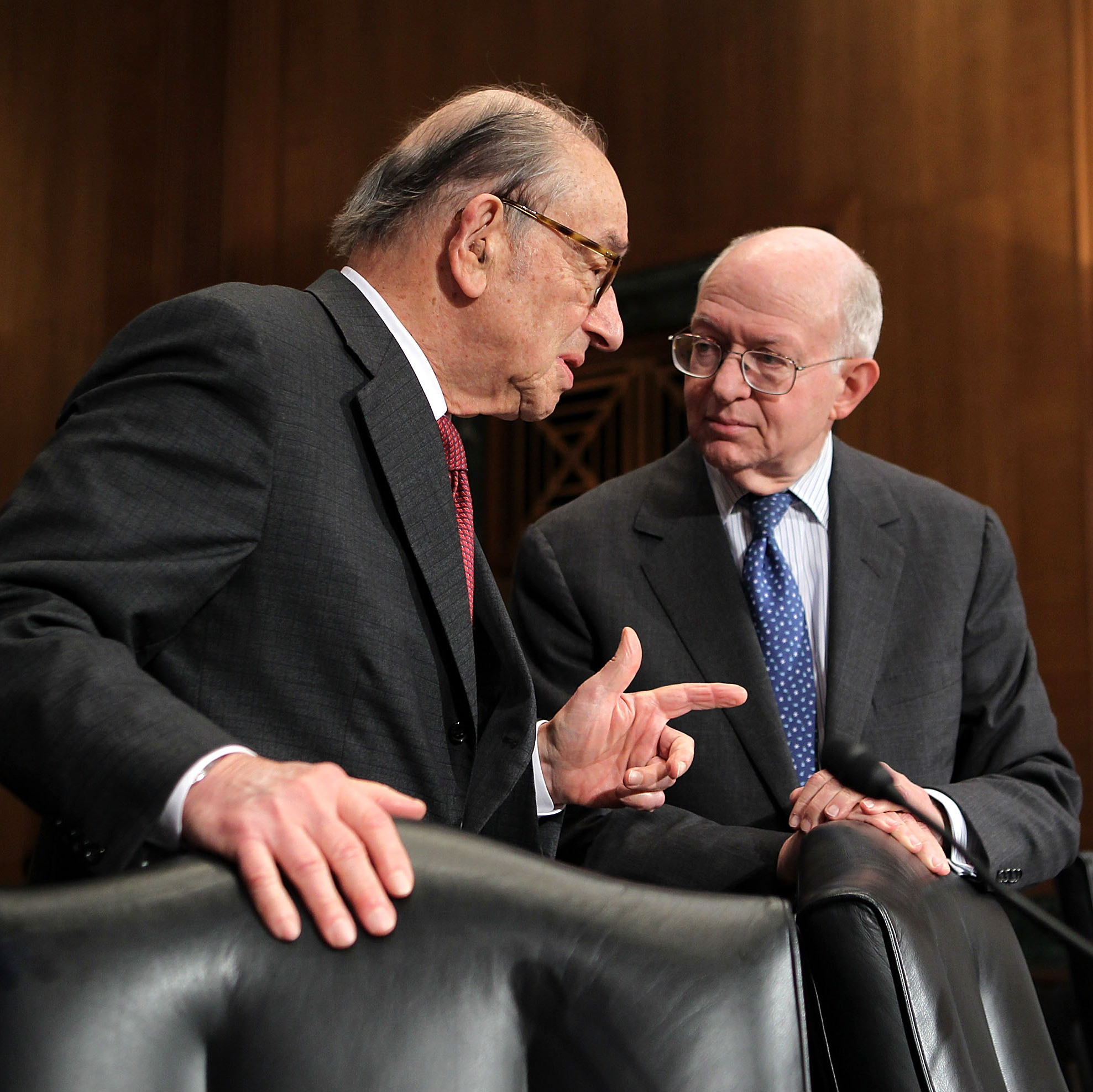 Stanford economics professor John Taylor (right) could be Romney's pick to replace Fed Chairman Ben Bernanke. Here, he speaks with former Federal Reserve Chairman Alan Greenspan. 