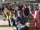 Floridians stand in line during the last day of early voting in Miami on Saturday. A judge extended early-voting hours in one Florida county Sunday after Democrats sued to allow more time. Floridians stand in line during the last day of early voting in Miami on Saturday. A judge extended early-voting hours in one Florida county Sunday after Democrats sued to allow more time.