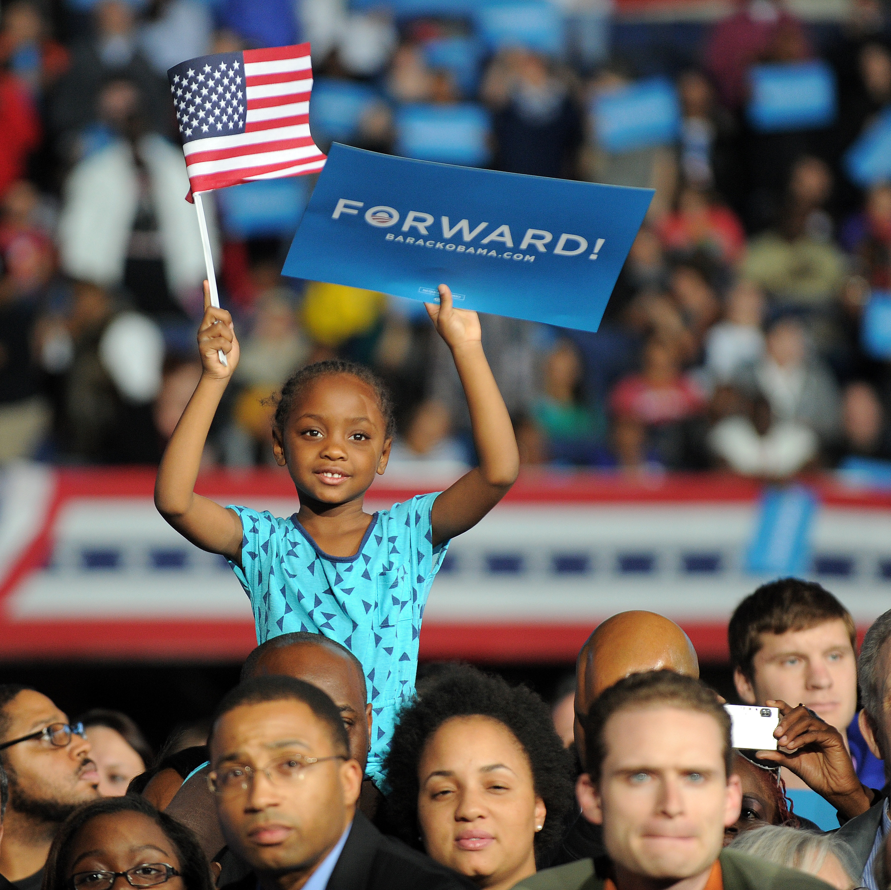 Supporters listen to President Obama at a campaign rally Monday in Columbus, Ohio.