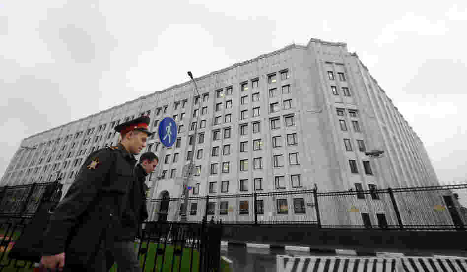 A Russian Army officer walks past Defence Ministry offices in Moscow, on Tuesday. Putin fired defence minister Anatoly Serdyukov over a corruption scandal, the most dramatic change to the government since he returned to the Kremlin for a third term.