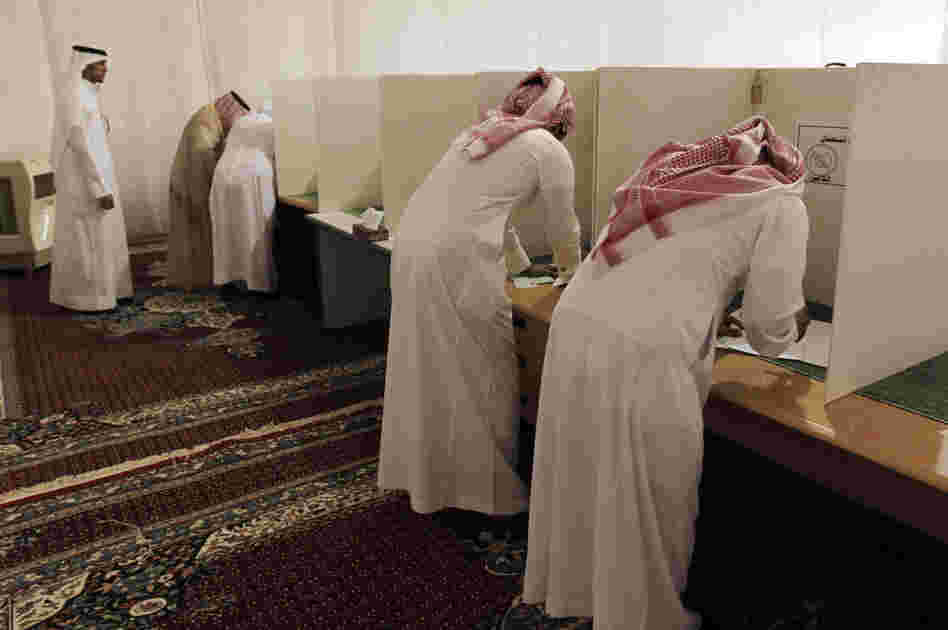 Voters cast ballots in municipal elections in Saudi Arabia. In 2011, King Abdullah of Saudi Arabia granted women the right to vote and run in municipal elections — but not until 2015.