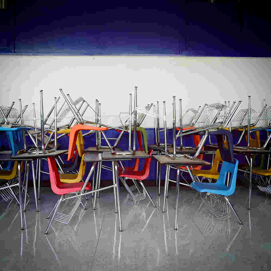 School desks are piled on top of each other at H.S. Thompson Elementary School in Dallas. Thompson was one of 11 schools closed by DISD in 2012.