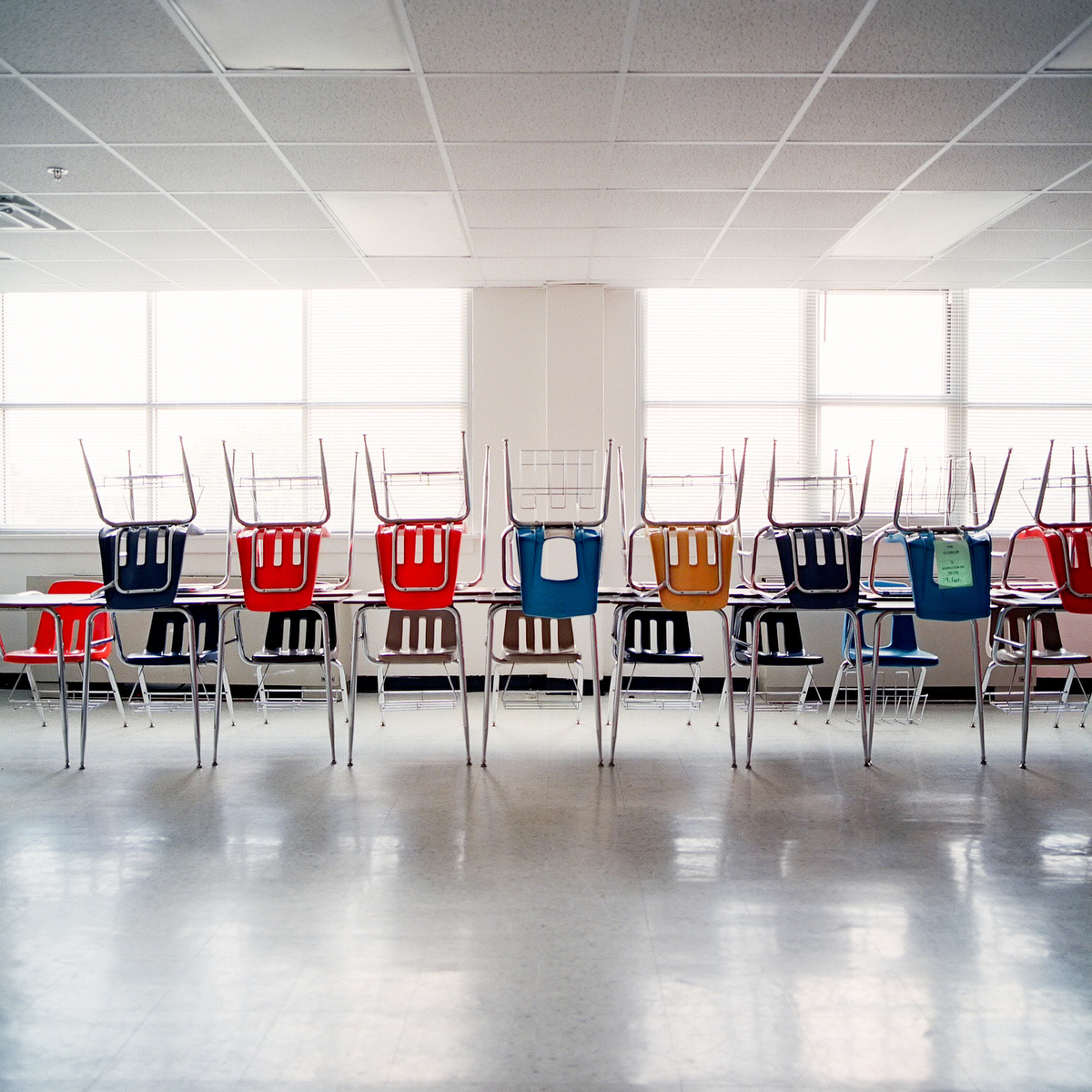 Desks are piled on top of each other at H.S. Thompson Elementary School.