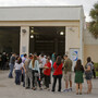 Voters stand in line as they prepare to cast their votes in Hialeah, Fla., on Tuesday. Voters stand in line as they prepare to cast their votes in Hialeah, Fla., on Tuesday.