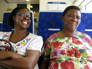 Refilwe Edith Seabi (left) and her sister Girlie are taking the Gautrain from Pretoria to go shopping in Johannesburg. Seabi is pleased when the ride clocks in at 30 minutes ? compared with a drive that sometimes takes her two hours. Refilwe Edith Seabi (left) and her sister Girlie are taking the Gautrain from Pretoria to go shopping in Johannesburg. Seabi is pleased when the ride clocks in at 30 minutes ? compared with a drive that sometimes takes her two hours.
