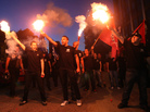 Members of the Greek ultranationalist Golden Dawn Party, sing the national anthem outside the party's office in Thessaloniki in June. The party's support has been boosted by anti-immigrant anger. Members of the Greek ultranationalist Golden Dawn Party, sing the national anthem outside the party's office in Thessaloniki in June. The party's support has been boosted by anti-immigrant anger.