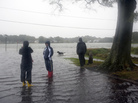Residents of the Colonial Place neighborhood watch as heavy rain from Hurricane Sandy floods the Lafayette River in Norfolk, Va., on Oct. 28. Residents of the Colonial Place neighborhood watch as heavy rain from Hurricane Sandy floods the Lafayette River in Norfolk, Va., on Oct. 28.